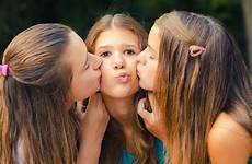 girl teenage kissed cheeks friends her dreamstime kissing stock
