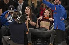 crowd jumbotron flashes game whitney cummings sweater knicks getting she pulls cam funny online nike sneaker boot dunk show