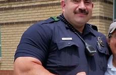 cops beefy muscular uniforms