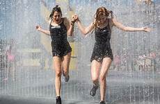 heat europe weather wave heatwave across wet day fountain getting people sweeps smoky off hottest london women fun cool mountain