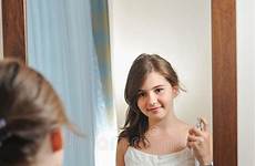 mirror girl teen beautiful looks her appearance studies she into stock young dreamstime reflection happy teenager bathroom bed laying smiling