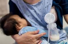 milk breastfeeding breast wet nursing woman baby another child someone