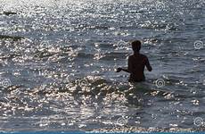 topless swim going woman stock tanned shiny sea ocean