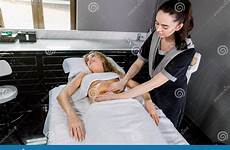 massage therapist female woman beautiful belly pretty young cosmetology medical having modern center women abdomen