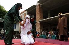 public woman sex caned indonesian punishment having young whipped muslim outside marriage whipping being aceh stage her man she indonesia