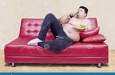 fat couch man lazy leaning beer drinking reclining food eating junk burger watching holding tv fresh