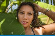 leaves banana posing indonesian isolated exotic smiling bikini asian tree natural happy woman young beautiful between