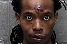 thug hunter shows woman video mugshot inmate he officer forehead bruise his public homeless sustained whose bloody hit him floor