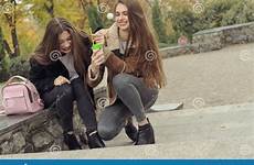 girlfriends outdoors warm drink try two hot preview casual lifestyle