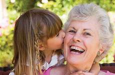 grandmother granddaughter old little her laughing strikes again kissed being