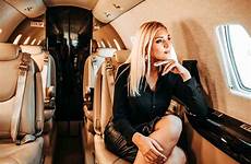 private jet woman charters luxury travel young seated