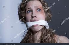 gagged kidnapped terrified mouth bruise female shutterstock search