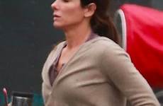 sandra bullock perky bust tight she coffee shows chest her off top carrying enormous plodded pick cup around need