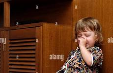 naughty chair girl stock young alamy sitting having two year old tantrum