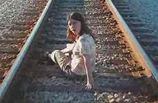 train over run girl woman falls gets off trestle