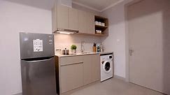 apartment interior design kitchen with washing machine and dining table