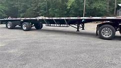 2014 Utility 53ft x 102in wide Flatbed trailer. Good brakes, good rubber, spread axle, steel 22.5 wheels, winches with straps and rails on both sides, fresh paint on the frame, toolbox and tarp rack,DOT ready to go! $24,900 | Rucker Equipment Co.