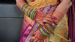 Woman dressed in traditional Indian clothes, and piaint of hand mehndi. hindu wedding. Close up view