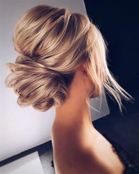 Wavy messy updo with locks to frame the face. Beautiful Messy Updo Hairstyle To Inspire Your Big Day ...