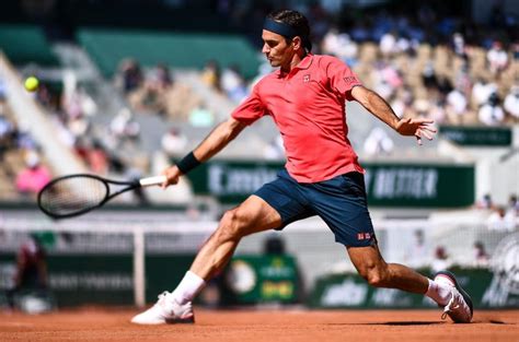 Switzerland's roger federer plays a return to britain's cameron norrie during the men's singles third round match on day six of the wimbledon tennis championships in london, saturday july 3, 2021. Wimbledon 2021: Roger Federer's last provocation