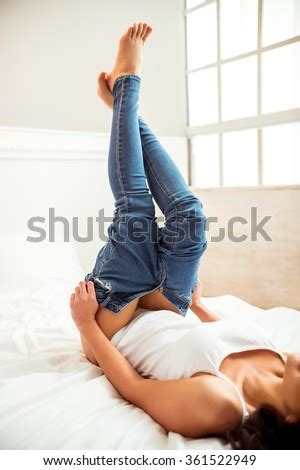 Woman taking off her underwear royalty free stock images. Young Beautiful Girl Underwear Taking Off Stock Photo ...