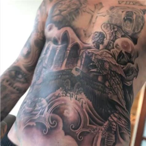 Hailey baldwin's husband justin bieber has a very interesting tattoo collection but what are they all? Justin Bieber Gets His Entire Abdomen in Covered in Ink by ...