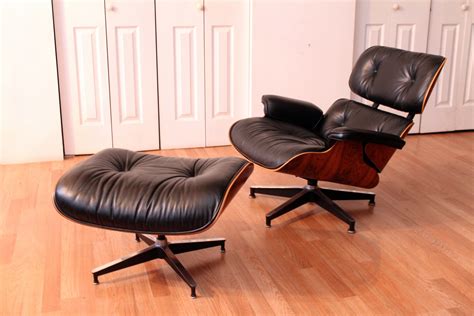 Herman miller is the higher end brand. Eames Rosewood Lounge Chair 670 and Ottoman 671 for Herman ...