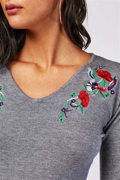 Buy knitted embroidery floral sweater with low price & high quality guaranteed. Embroidered Flower Knit Sweater - Just $7