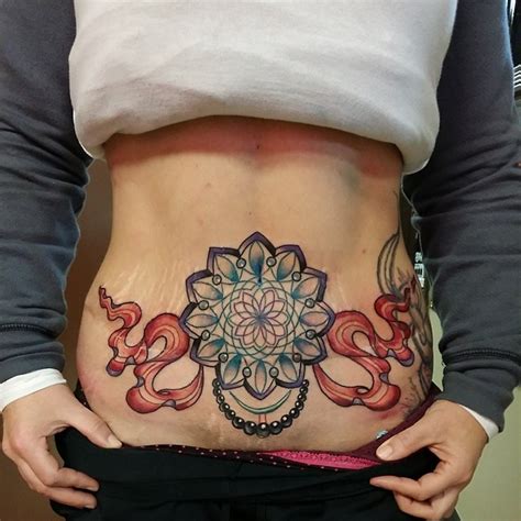 See more ideas about tattoos, body art tattoos, stomach stretch marks. Image result for pictures of tattoos to cover stretch ...