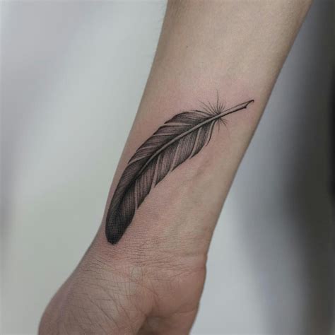 Feather tattoo designs can be elegant or unique depending on the particular bird that they are taken from. wrist feather tattoo - Recherche Google | Feather tattoo ...