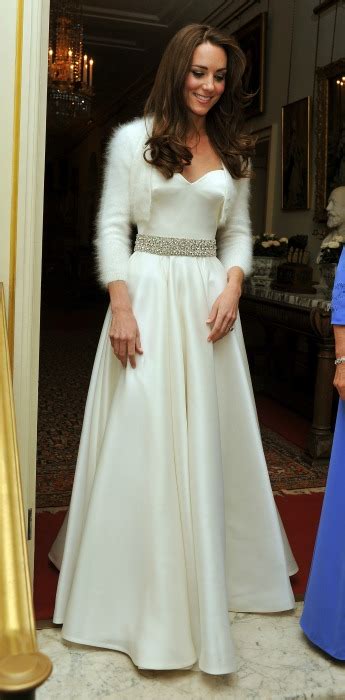 Meghan markle wearing stella mccartney at the queen's birthday party concert on 21 april 2018. Royal brides' second wedding dresses: Kate Middleton ...