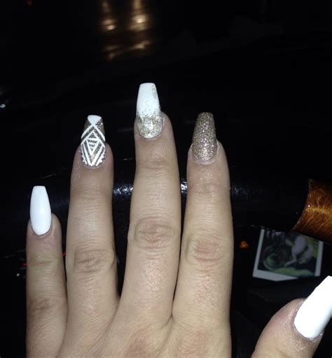 Many women spend much time and money having their fingernails painted and decorated. White and gold | My nails, Nails, Gold