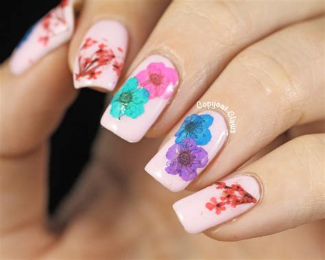 Florals for spring might not be groundbreaking, but flower nails will always be a spring staple! Copycat Claws: Real Dried Flower Nail Art