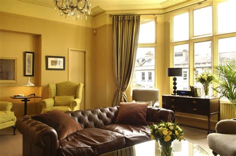 Family room design ideas yellow walls burgundy curtains. Yellowish Color Schemes for Living Room | My Decorative