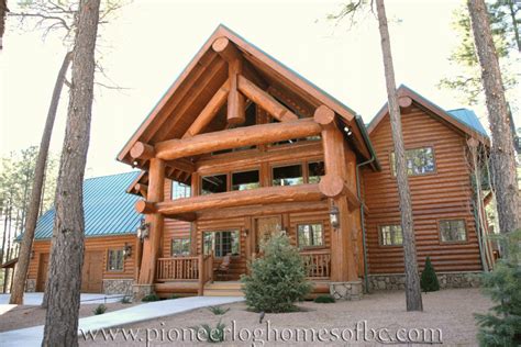 The pioneer cabin features a porch on the long side of the cabin. Gallery Log Homes - Pioneer Log Homes Midwest