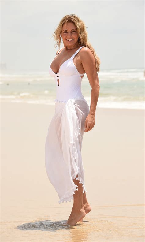 Skinny ebony darling with a nice body maya bijou gets rammed by her white partner. Carol Vorderman Enjoys Long Walks On A Beach - The ...
