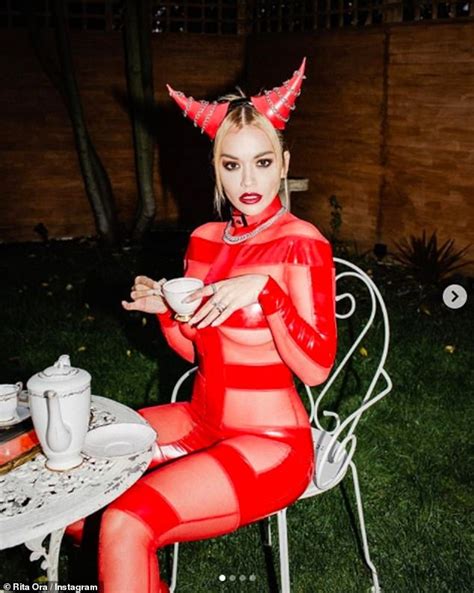 She devil in catsuit hd. Rita Ora puts on a VERY racy display in sheer panelled PVC ...