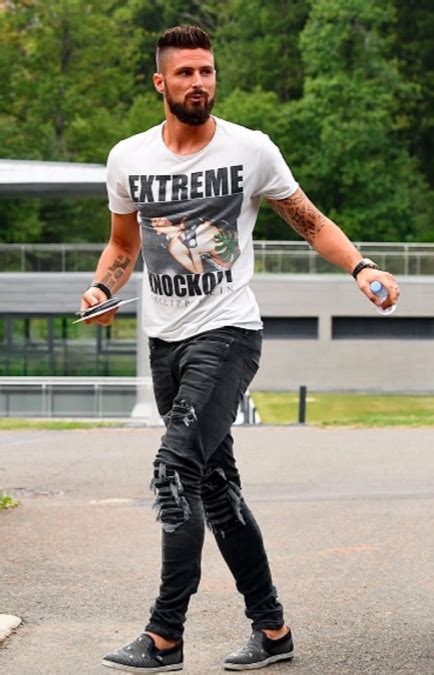 After a scandal involving his personal life, the frenchman was recalled to the arsenal team to. Olivier Giroud wearing "Extreme Knockout" T-shirt by ...