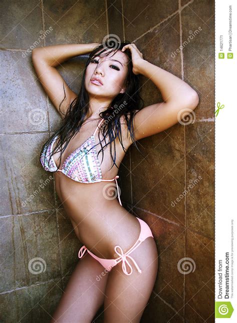 Many asian women complain that when they try to dye their hair light brown or dark blonde, it barely lightens. Beautiful Asian With Wet Hair. Stock Image - Image of ...