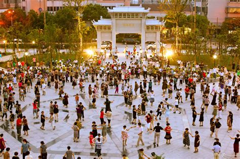 A dance in which sets of four couples form squares. Square dancing in China > McDaniel College ...