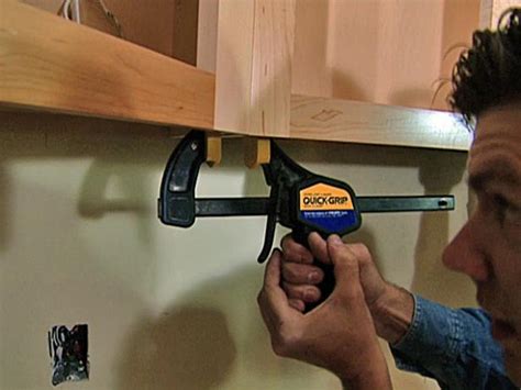A fresh coat of paint on the cabinets changes the entire look and feel of the room. How to Replace Kitchen Cabinets | how-tos | DIY