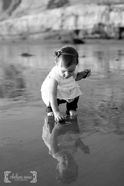 Adrianne black has fun at the beach. Carlsbad Beach Family Photos