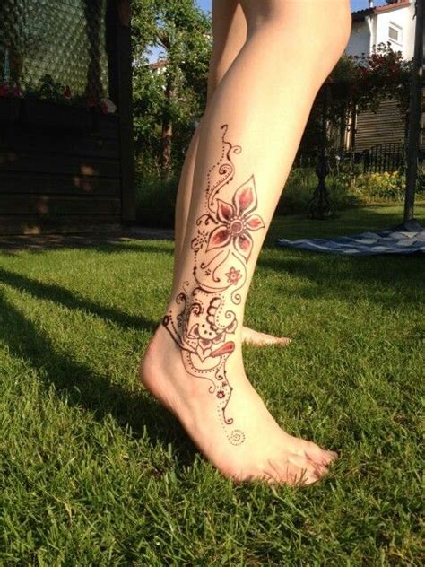 Temporary tattoos are more popular (and more realistic) than ever. a far cry from the cheesy temporary tattoos we used to buy out of gumball machines. blog lifted voices. floral henna tattoo design | Henna tattoo designs, Henna ...