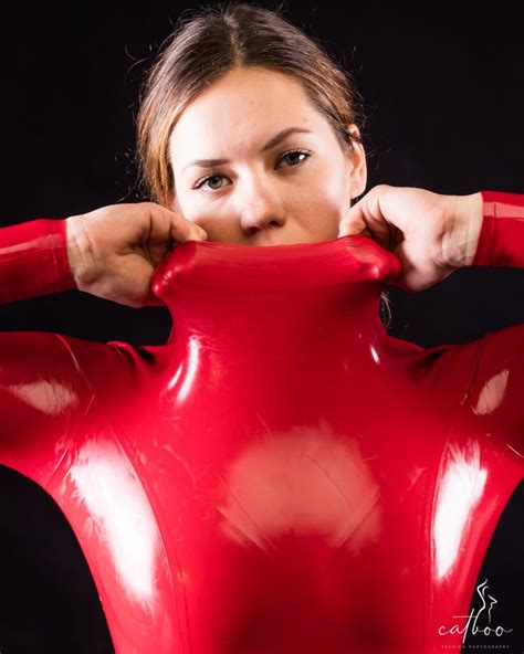 Versatile beauty with a ff surprise come watch work it. Set: Polina wearing a Red Latex Catsuit - Welcome to CATBOO