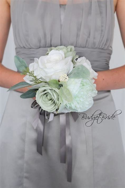 Cascading mint and coral wedding bouquets. Davids Bridal Mint and Sage Green Cascading Wedding ...