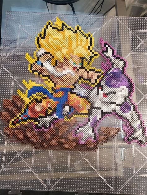 Modèles pixel art sur le thème de noël : Pin by Gema Sanz on DragonBall + in 2020 | Anime pixel art ...