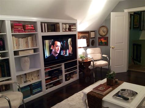 Wall mounted tv, ceiling tv, diy tv wall mount. Slanted ceiling tv room and library! | Tv room, Slanted ...