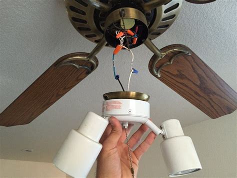 How can you add a standard light fixture to a ceiling fan? Ceiling Fan Light Fixture Replacement | Ceiling fan light ...