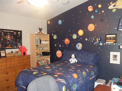 Spicing things up in the bedroom might be helped by taking things outside of the bedroom. A Beagle and A Baby: This is our......outer space bedroom