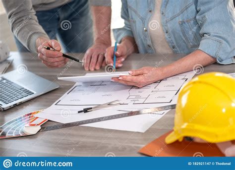 For example, if the cost of development is $500,000 and the developer's fee is 5 percent, your equation would be 500,000 x.05. Architects Working On New Construction Project Stock Image ...